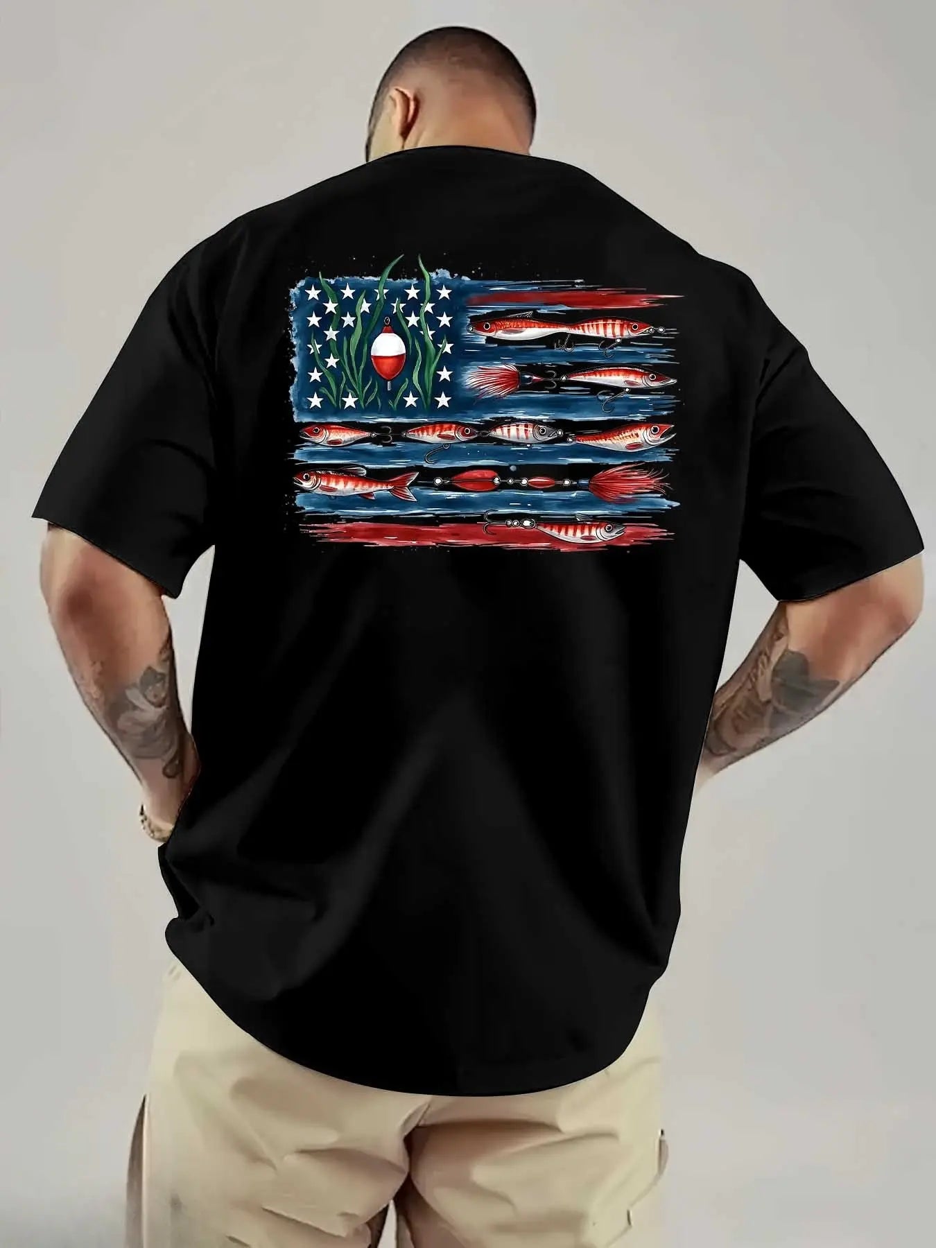 American Flag And Fish Print Short-Sleeve T-Shirt. The Design Combines The American Flag with Fishing Elements, Making It Suitable for Outdoor Fishing Enthusiasts in Summer. It'S a Great Father'S Day Gift Or a Special Present for Fishing Lovers.